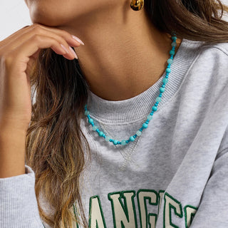 Detalle cuentas resina efecto piedra natural color turquesa 0,65 cm