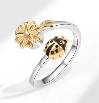 Anillo antiestrés giratorio plateado con girasol dorado y mariquita negra ajustable para mujer
