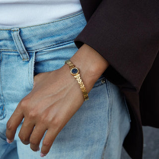 Brazalete estilo reloj de acero inoxidable – Diseño elegante