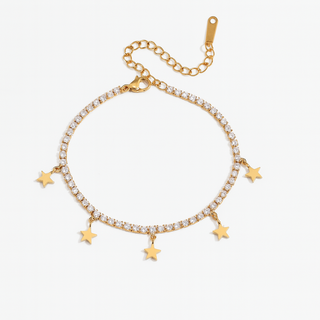 pulsera dorada con estrellas colgantes y circonitas