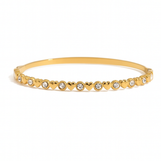Pulsera rígida de corazones con circonitas – Acero dorado