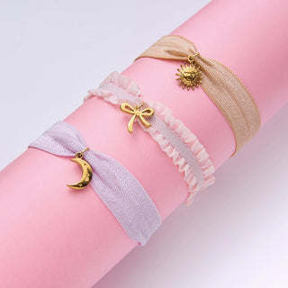 Pulseras de Tela con charms Dorados | Luna, Sol y Lazo