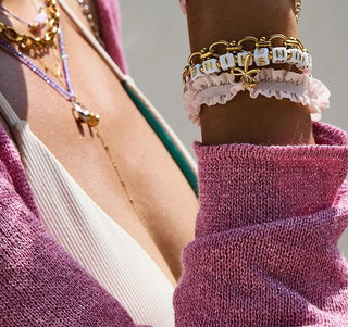 pulsera tela charm lazo